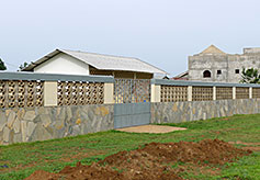 The completed wall surrounds the property