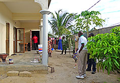 People Gathering in Inclosed Front Yard