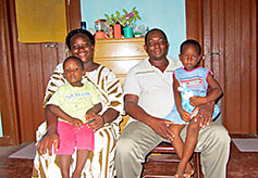 Pastor Moussa's Family Pose for a Photo Inside the House