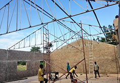 The trusses are attached to the walls