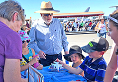 Carol's grandson selects our best-selling toy airplane