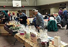 The Dicksons look over a few of the raffle items