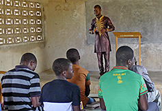 Koffi preaching on a Sunday morning