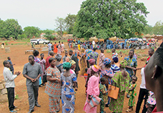 The guests visit and eat lunch together after the ceremony